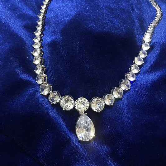 The Royal Coronation Diamond Necklace & Earrings worn by Queen Elizabeth II & Queen Camilla