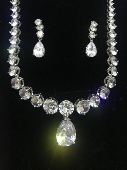 The Royal Coronation Diamond Necklace & Earrings worn by Queen Elizabeth II & Queen Camilla